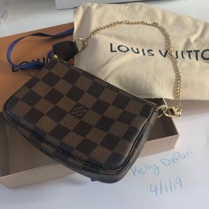 Brand New Authentic Louis Vuitton mini pouchette